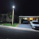 Lámpara Solar de Calle LED de 40W con Panel Integrado de 21W, 13.5V y Sensor de Movimiento, SMD2835 x 90pcs, 5000K, 140x70 Grados, Con Batería de Litio 115.2Wh, 9.6V, 12000mAh, IP65, Negra, 150Lm/W